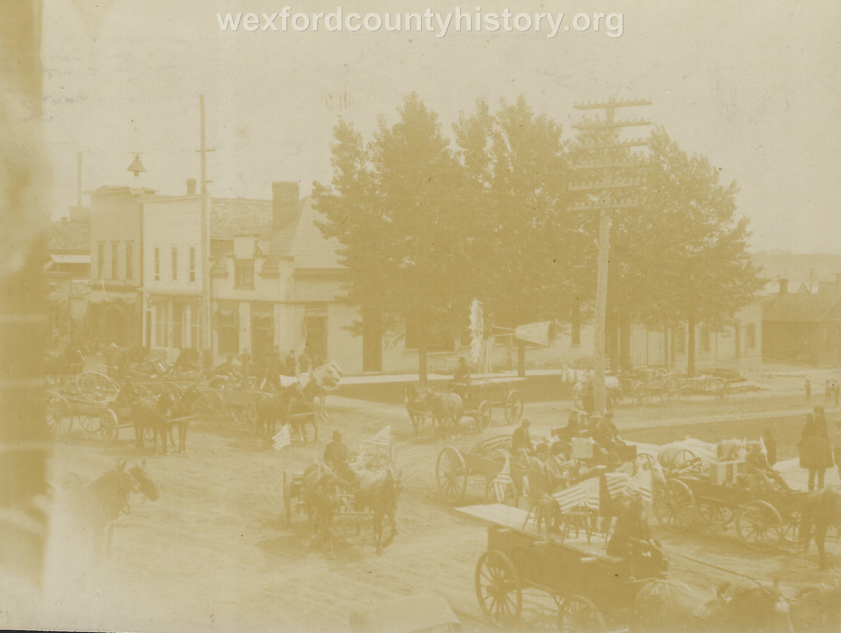 Cadillac-Parade-1902-Street-Fair-At-The-Intersection-Of-Cass-And-Mitchell-Streets-Showing-The-Southwest-Corner