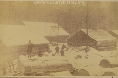 Cadillac-Lumber-Huge-Logs-In-The-Snow-Near-Camp