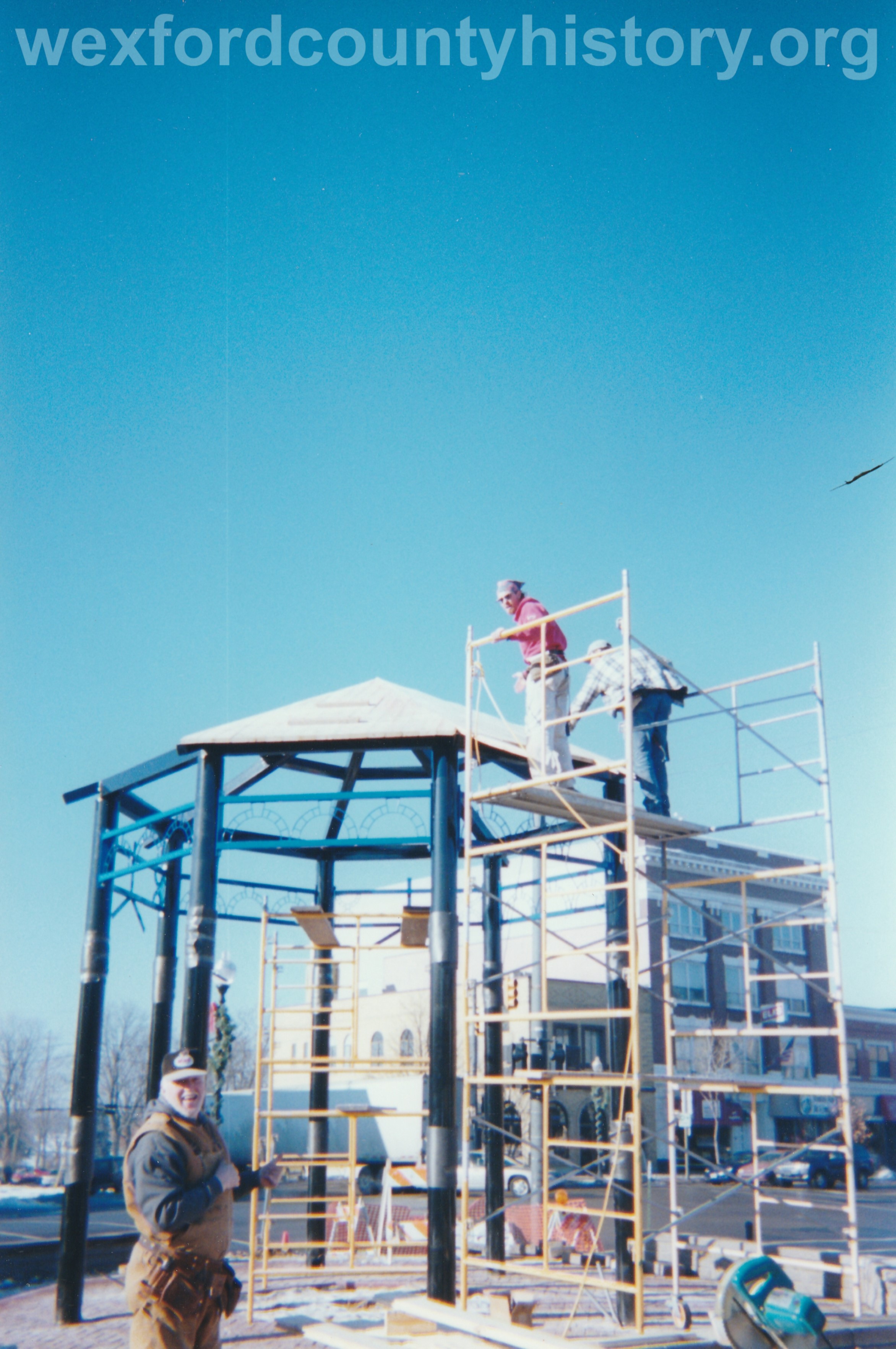 Installing The Clock Tower On The Southeast Corner Of Cass And South Mitchell