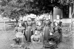 Women Pose in A Yard